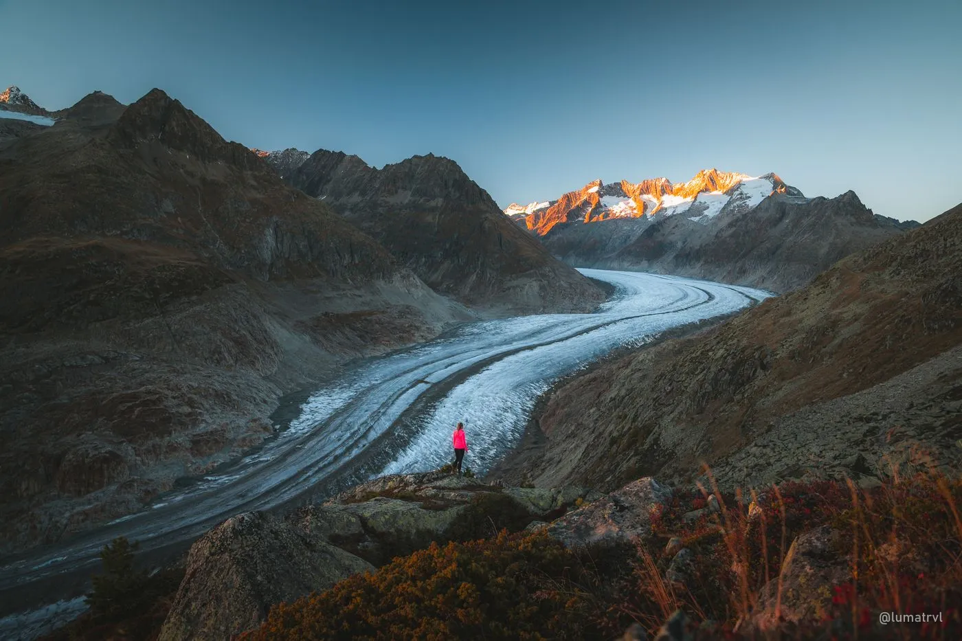 A hiker on the trail above the Aletsch Glacier